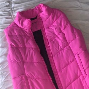 Bright pink puffy vest